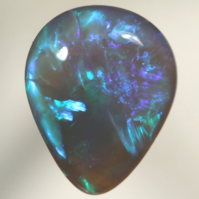 SOLID BLACK CRYSTAL OPAL Loaded with bright colours